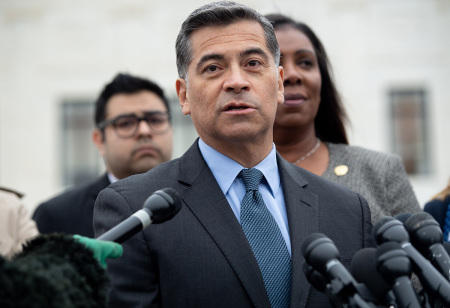 Then-California Attorney General Xavier Becerra speaks outside the U.S. Supreme Court in Washington, D.C., November 12, 2019. 