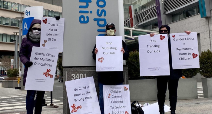 Parents protest outside Children's Hospital in Philadelphia, Pa., on Feb. 14, 2021. 