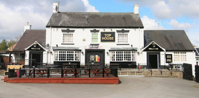 Police said the pub car park did not qualify as a place of worship under the ongoing COVID-19 lockdown rules.