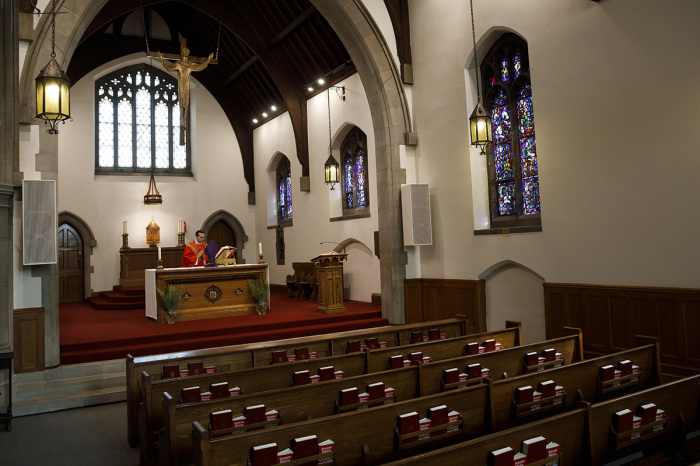 Father Peter Turrone leads a Palm Sunday mass to an empty church at the St. Thomas Aquinas Catholic Church on April 5, 2020, in Toronto, Canada. 