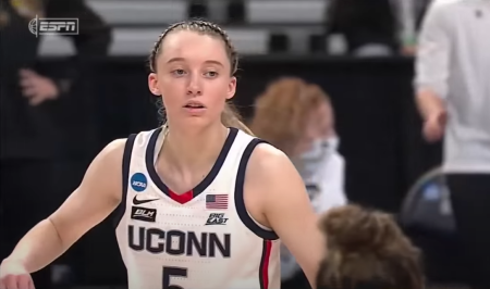 UConn star Paige Bueckers celebrates after making a shot in a victory against the University of Iowa in the Sweet 16 of the NCAA Tournament on March 27, 2021. 