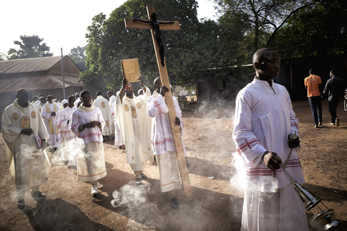 Altar servers are seen during a procession before the liturgy in the occasion of the National Pilgrimage in Kita on November 22, 2020. Since 1966, when the bishops of Mali decided to make Kita the site of a National Pilgrimage, the faithful made the journey to the holy sanctuary of Kita where the statue venerated as Notre Dame de Mali is situated. The central theme of this year's gathering is the reconciliation of Mali and the freedom of Sister Gloria, kidnapped three years before in Sikasso. 