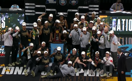 The Baylor University men's basketball team celebrates winning the NCAA National Championship on April 5, 2021 in Indiana, Indianapolis. 