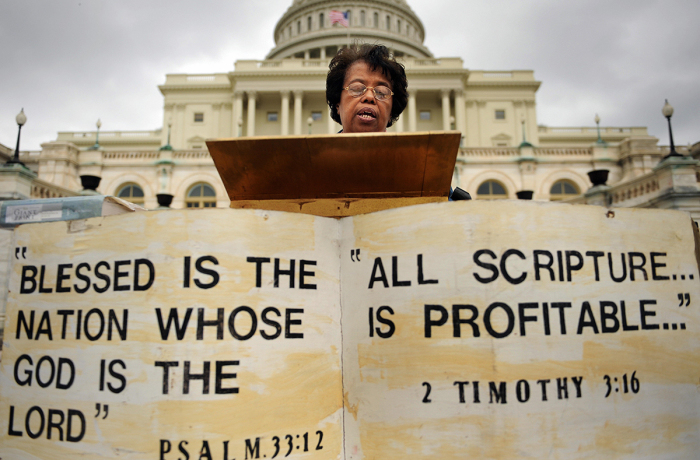 Thelma Dephas of Shiloh Baptist Church in Landover, Maryland, seen taking part in the 20th annual U.S. Capitol Bible Reading Marathon, a 90-hour front-to-back oral reading of the Bible on May 6, 2009, on the West Front of the U.S. Capitol in Washington, D.C.