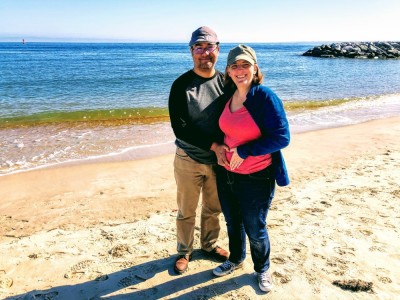 Joy Granados pregnant with baby Mateo Augusto and husband, Vini, at the beach. 