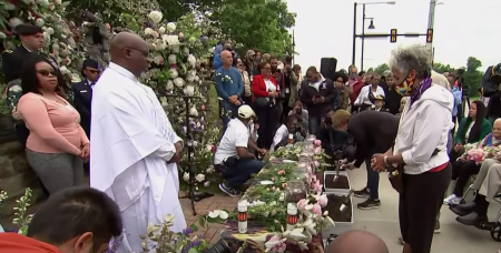 People attend a remembrance ceremony and candlelight vigil in Tulsa, Oklahoma, on May 31, 2021, to commemorate the centennial of the 1921 Tulsa Race Massacre. 