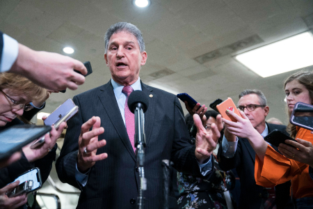 Sen. Joe Manchin, D-WV, speaks to the press near the Senate subway following a vote in the Senate impeachment trial that acquitted President Donald Trump of all charges on February 5, 2020, in Washington, D.C. 