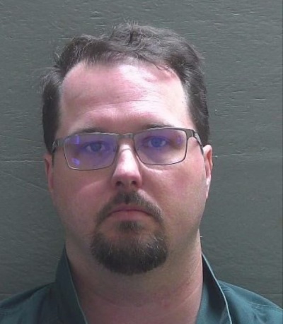 A mugshot of David Patrick Nims, a youth pastor at Calvary Baptist Church of Pensacola, Florida, who was arrested in June for accusations of second-degree felony video voyeurism, and later, possession of child pornography. 