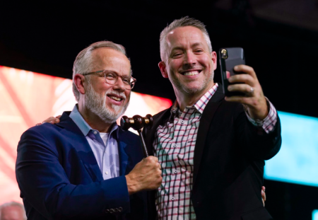 Newly elected Southern Baptist Convention president Ed Litton and outgoing president J.D. Greear take a selfie after Greear pounded the gavel for the last time June 16, 2021, to close the SBC Annual Meeting. Litton will open the 2022 SBC Annual Meeting in Anaheim, California, with the pound of the gavel.