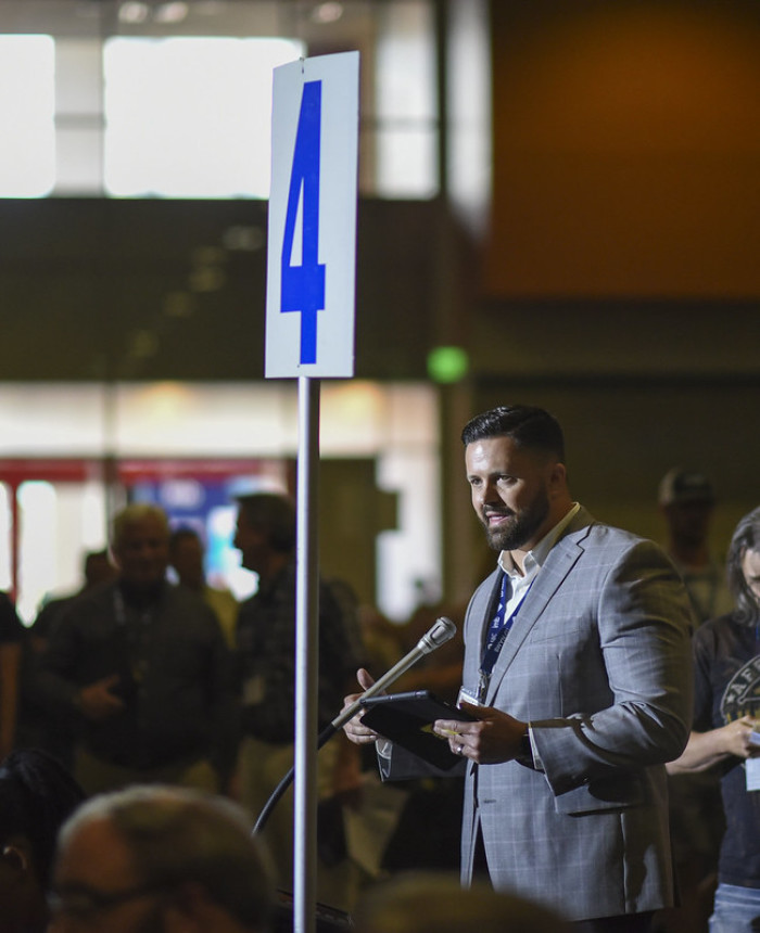 Grant Gaines, the pastor of Belle Aire Baptist Church in Murfreesboro, Tenn., presents a motion during the morning session of the SBC Annual Meeting on June 16, 2021.