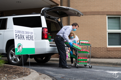 Volunteers seen at an Operation Christian Child drop-off location in 2020.