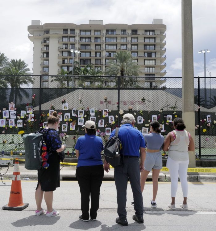 With so many loved ones still missing, family members and friends have created a memorial wall one block west of the 12-story building.