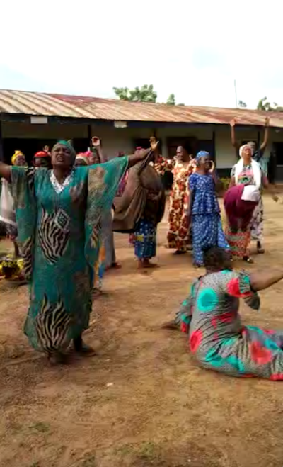 Nigerian parents pray for the safe return of their children kidnapped on July 5, 2021. 