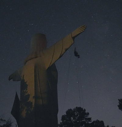 Activists displayed the pro-abortion banner on the Jesus statue on the night of July 8, 2021. 