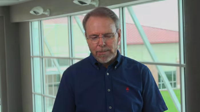 Bruce Wesley, lead pastor of the multisite Clear Creek Community Church in League City, Texas, prays against COVID-19 infections on Sunday July 11, 2021.