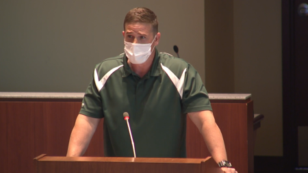 Byron Tanner Cross, a physical education teacher at Leesburg Elementary School, speaks before a meeting of the Loudon County School Board of Loudon, Virginia, on Tuesday, May 25, 2021. 