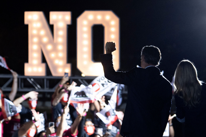 California Governor Gavin Newsom and wife Jennifer Siebel Newsom leave after a campaign event at Long Beach City College in Long Beach, California on September 13, 2021. 