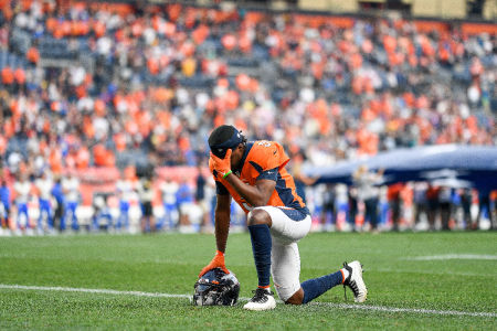 Teddy Bridgewater of the Denver Broncos kneels on the field before an NFL preseason game against the Los Angeles Rams at Empower Field at Mile High on August 28, 2021 in Denver, Colorado.