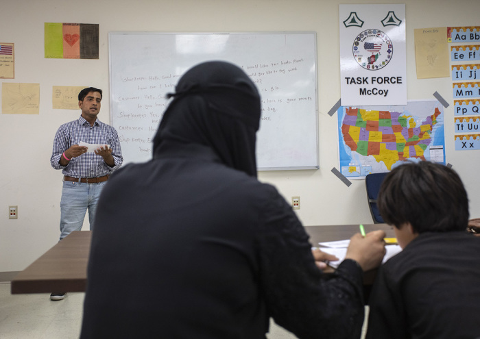 Afghan refugees take an educational class at Ft. McCoy U.S. Army base on September 30, 2021, in Ft. McCoy, Wisconsin. There are approximately 12,600 Afghan refugees being cared for at the base under Operation Allies Welcome. The Department of Defense, through U.S. Northern Command and U.S. Army North, and in support of the Department of Homeland Security, is providing transportation, temporary housing, medical screening and general support for at least 50,000 Afghan evacuees at suitable facilities in permanent or temporary structures while the Afghans complete the processing necessary to resettle in the United States. 