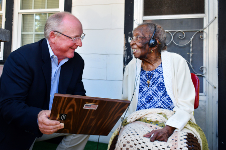 David Weiss, chair of The Clarke County Board of Supervisors, presents Viola Brown with a plaque containing the 'Viola Roberts Lampkin Brown Day' proclamation on Oct. 4. 2021