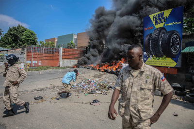 Tires are burning following a call for a general strike by several professional associations and businesses to denounce the insecurity in Port-au-Prince on October 18, 2021. - A nationwide general strike emptied the streets of Haiti's capital Port-au-Prince on Monday with organisers denouncing the rapidly disintegrating security situation highlighted by the kidnapping of American and Canadian missionaries at the weekend. The kidnapping of 17 adults and children by one of Haiti's brazen criminal gangs underlined the country's troubles following the assassination of president Jovenel Mose in July and amid mounting lawlessness in the Western hemisphere's poorest nation. 