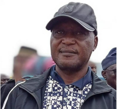 Luka Binniyat, a Nigeria-based reporter for The Epoch Times, attends an interment ceremony in Madamai, Nigeria, Sept. 28, 2021.