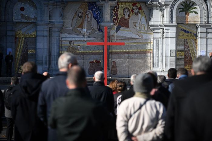 Catholic church bishops and faithful gather during a ceremony at the sanctuary of Lourdes, France, on Nov. 6, 2021. 