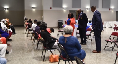 Sylvia Bennett-Stone, the executive director of the group Voices of Black Mothers United, speaking at an event alongside with Jefferson County, Alabama Sheriff David Agee and mental health specialist Dr. Jeffrey Moore of J.R. Moore and Associates. 