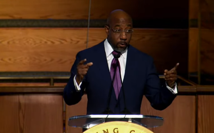 Sen. Raphael Warnock, D-Georgia, speaks at the historic Ebenezer Baptist Church in Atlanta where he also serves as pastor on Jan. 17, 2022.