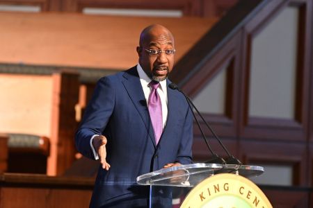 Senator Raphael G. Warnock attends the 2022 King Holiday Observance Beloved Community Commemorative Service at Ebenezer Baptist Church on Jan. 17, 2022, in Atlanta, Georgia. 