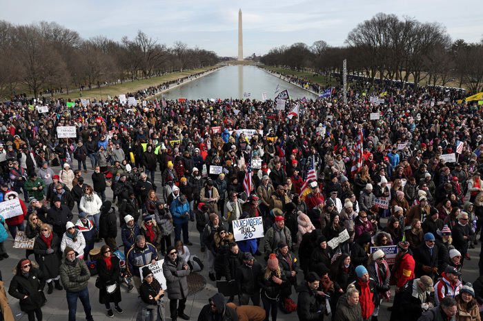 Americans protesting government and business mandates forcing employees to get COVID-19 injections participate in a rally after a Defeat The Mandates DC march at the Lincoln Memorial in Washington, D.C., on January 23, 2022. Activists took part in the event “for the preservation of personal sovereignty and to STOP medical coercion, discrimination” in response to the Biden administration’s vaccination mandates.