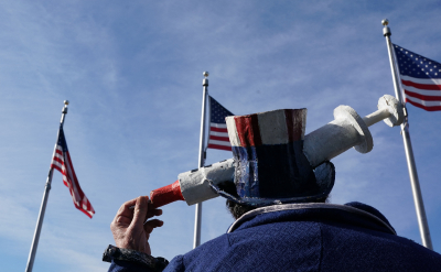 Demonstrators participate in a Defeat the Mandates march against vaccine mandates in Washington, D.C., on January 23, 2022. 