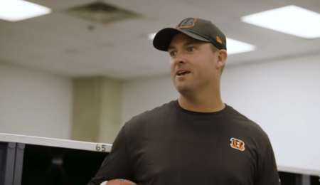 Cincinnati Bengals head coach Zac Wilson speaks with his team after a game. 