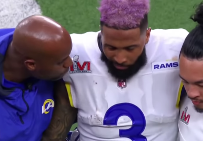 Odell Beckham Jr. is helped off the field after suffering a knee injury during Super Bowl LVI on Feb. 13, 2022, in Inglewood, California. 