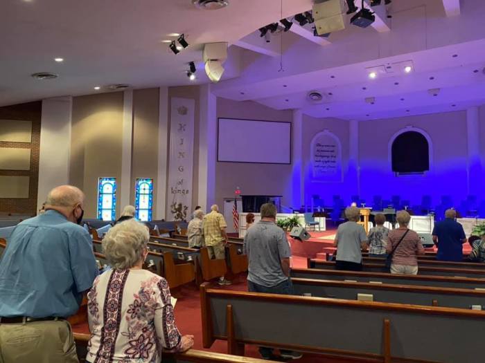 Hilldale Baptist Church members in Tennessee during a worship service.