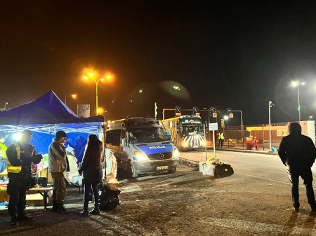 A bus drives across the border from Ukraine into Poland in March 2022. 