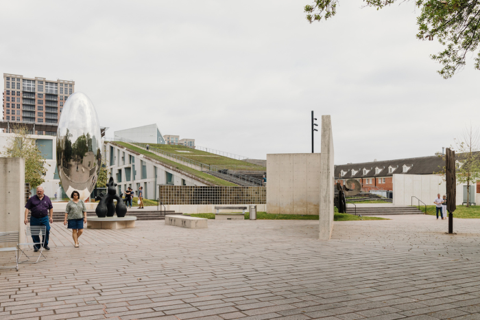 Outside the Museum of Fine Arts in Houston is an outdoor space with sculptures and a rooftop garden. 