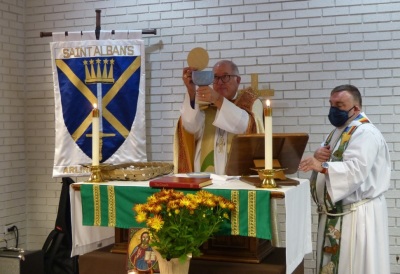 Bishop J. Scott Mayer of The Episcopal Church of North Texas, leading worship at St. Alban's Theatre in Arlington, Texas. 