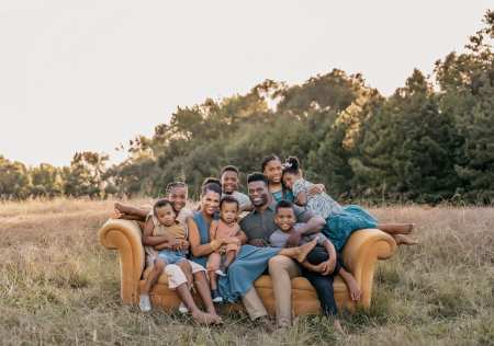 Benjamin and Kirsten Watson appear with their seven children.