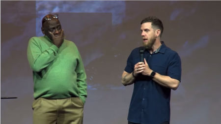 Walter Hooker (L), the senior associate pastor, of Bellevue Christian Center in Bellevue, Nebraska, weeps after revealing lead pastor, Andy Kaup (R), will donate a life-saving kidney to him on Aug. 2. 2022.