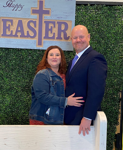 Stanley Stever stands next to his wife, Amy.