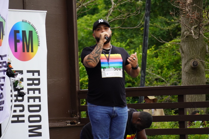 A crowd member named Luis Javier Ruiz led a prayer at the Freedom march at the Sylvan Theater in Washington, D.C., on June 11, 2022. 