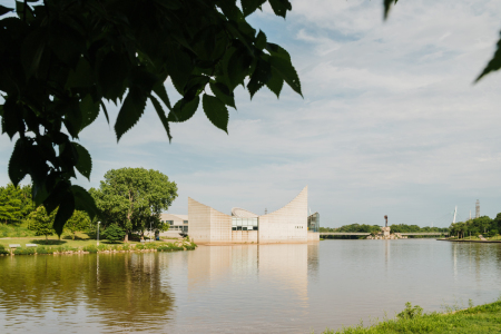 Pathways and parks line Arkansas River connecting downtown Wichita with several of the museums. 