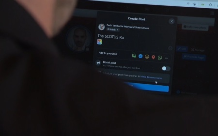 Republican Maryland Senate candidate Zach Tomlin types in a post on social media during video clip aired by WBFF in July 2022. 