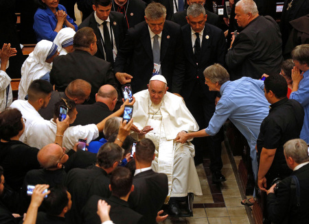 Pope Francis departs after presiding over an evening prayer service at the Basilique-cathedral Notre-Dame in Quebec, Canada, on July 28, 2022. 