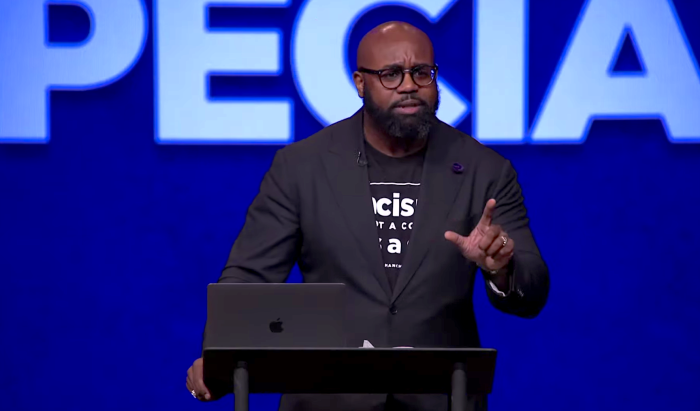 Pastor John Amanchukwu, a former football player for North Carolina University, speaks at Cornerstone Chapel in Leesburg, Virginia, on Aug. 17, 2022. 