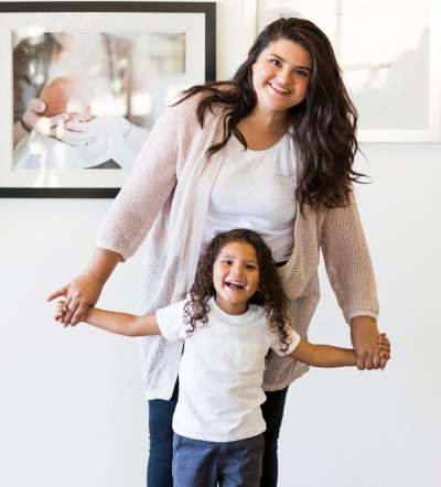 Maddie Martinez, who serves as groups coordinator for the pro-life group Embrace Grace, poses for a picture with her son Mateo. 