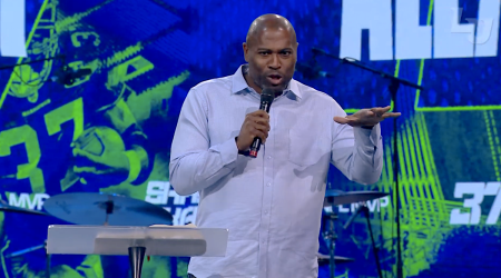 Former NFL MVP Shaun Alexander speaks during a convocation ceremony at Liberty University in Lynchburg, Virginia, on Sept. 2, 2022. 