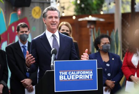 California Gov. Gavin Newsom speaks during a bill signing ceremony at Nido's Backyard Mexican Restaurant on Feb. 9, 2022 in San Francisco, California.