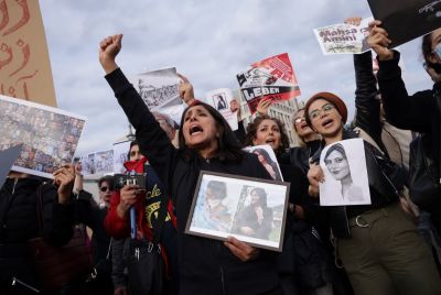 Protesters gather to demonstrate against the death of Mahsa Amini in Iran on September 23, 2022, in Berlin, Germany.